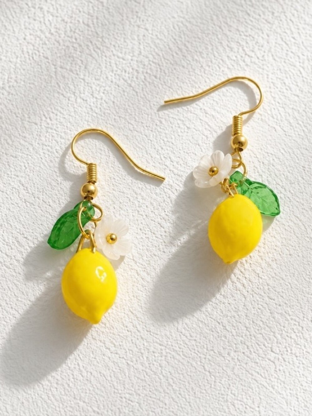 Gold Lemon Drop Earrings with White Flower and Green Leaf
